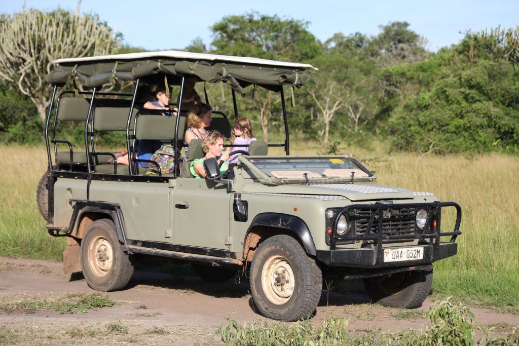 Guests on a game drive in Lake Mburo National Park, is a sample of safari vehicles that we offer for car hire.