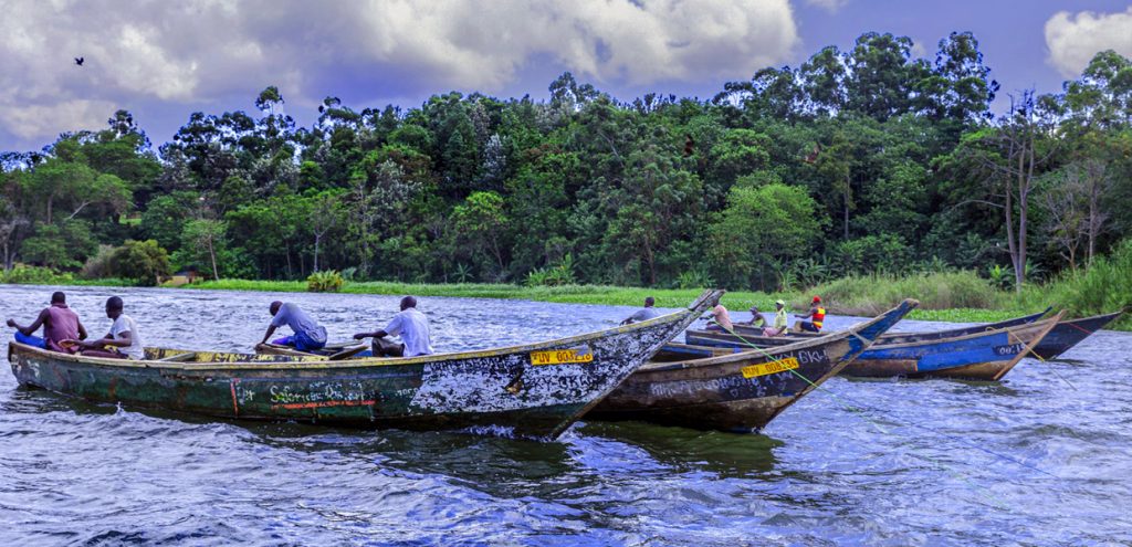 Some of the fishermen tending to their boats at Lake Nakivale, Lake Mburo National Park